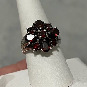 Garnet and Silver Ring with Intricate Detailing